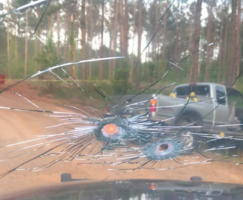Bullets struck the windshield of a Neshoba County Sheriff’s car after a suspect opened fire.